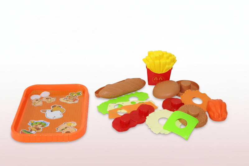 Toy food items including a hot dog, bun, and fries on a wooden surface with an orange tray.