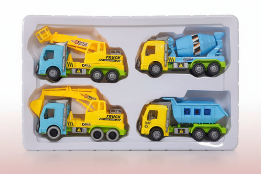 Set of toy construction vehicles in packaging on a wooden surface