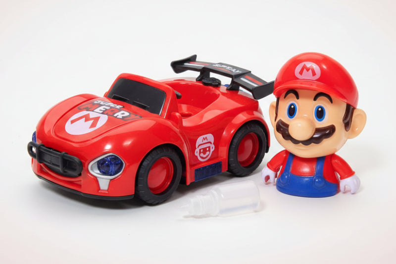 Toy car with Mario figure on a wooden surface