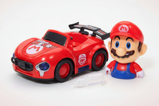 Toy car with Mario figure on a wooden surface