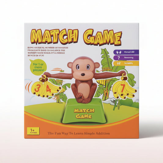 Board game box titled 'Match Game' with a monkey and banana design on a wooden surface.