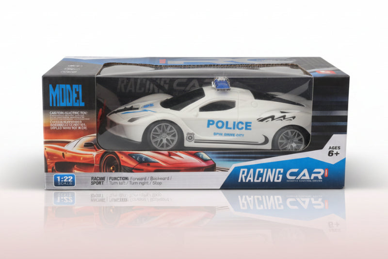 Model police car in packaging on a wooden surface with a white wall background
