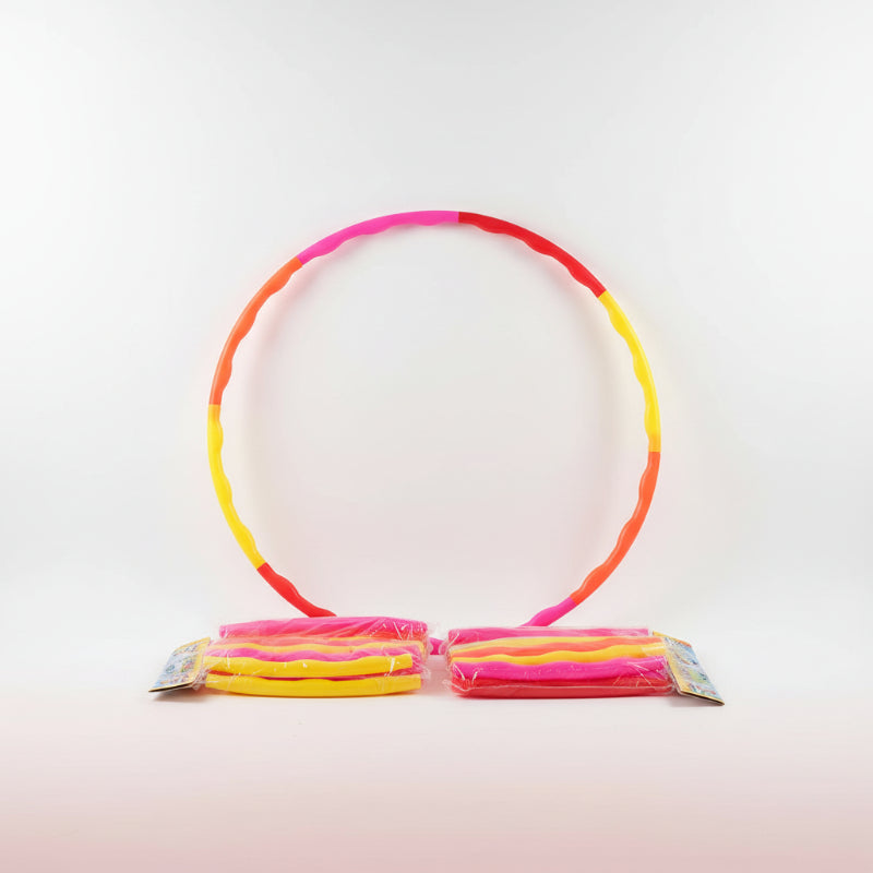 Colorful hula hoop on a white background with packaging in the foreground.