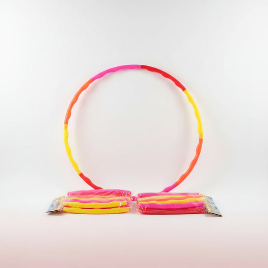Colorful hula hoop on a white background with packaging in the foreground.