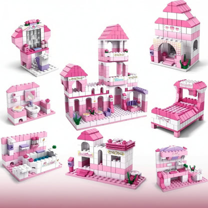 Pink toy castle set with various pieces on a white background