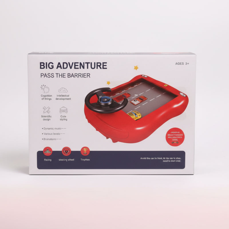 Box of a toy car game with steering wheel and road design, labeled 'Big Adventure Pass the Barrier'.